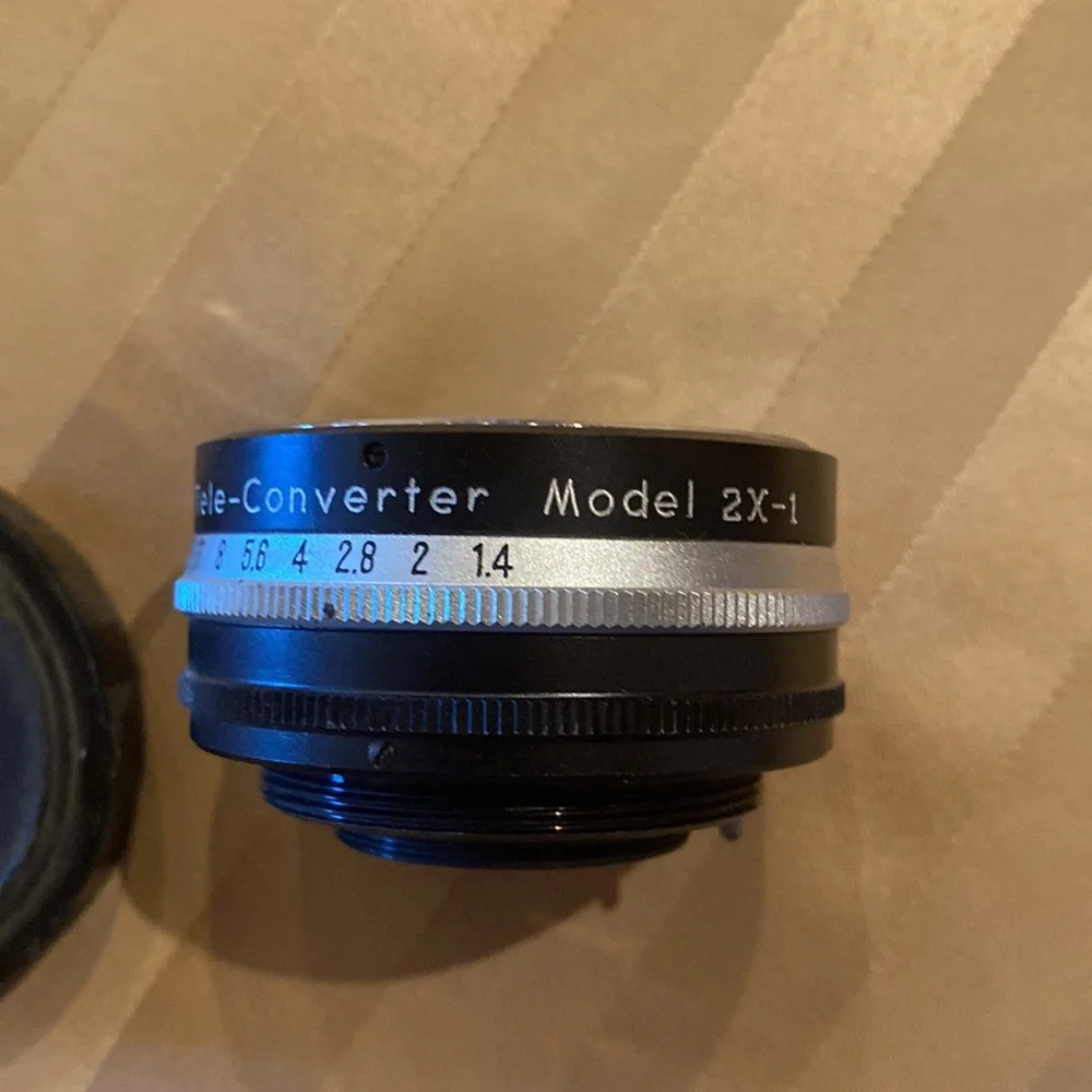 Vivitar auto 2x custom tel-converter model 2x-1, 1 cover lens clean
